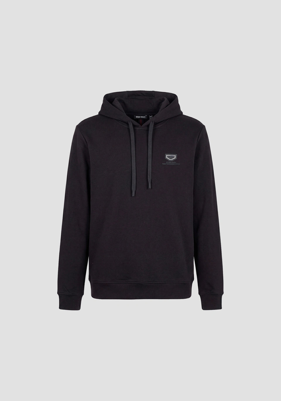 Black relaxed-fit hoodie in cotton fleece with metal plate on heart