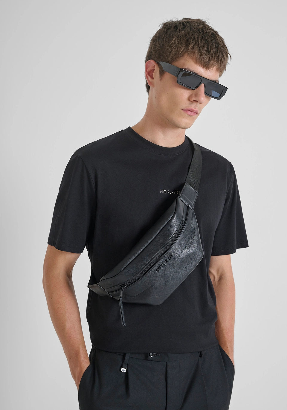POUCH IN MACHINED IMITATION LEATHER