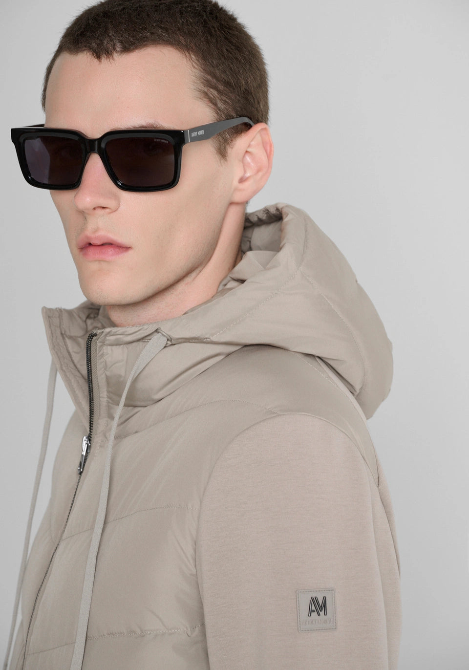 Grit slim-fit coat in padded techno fabric with contrast inserts
