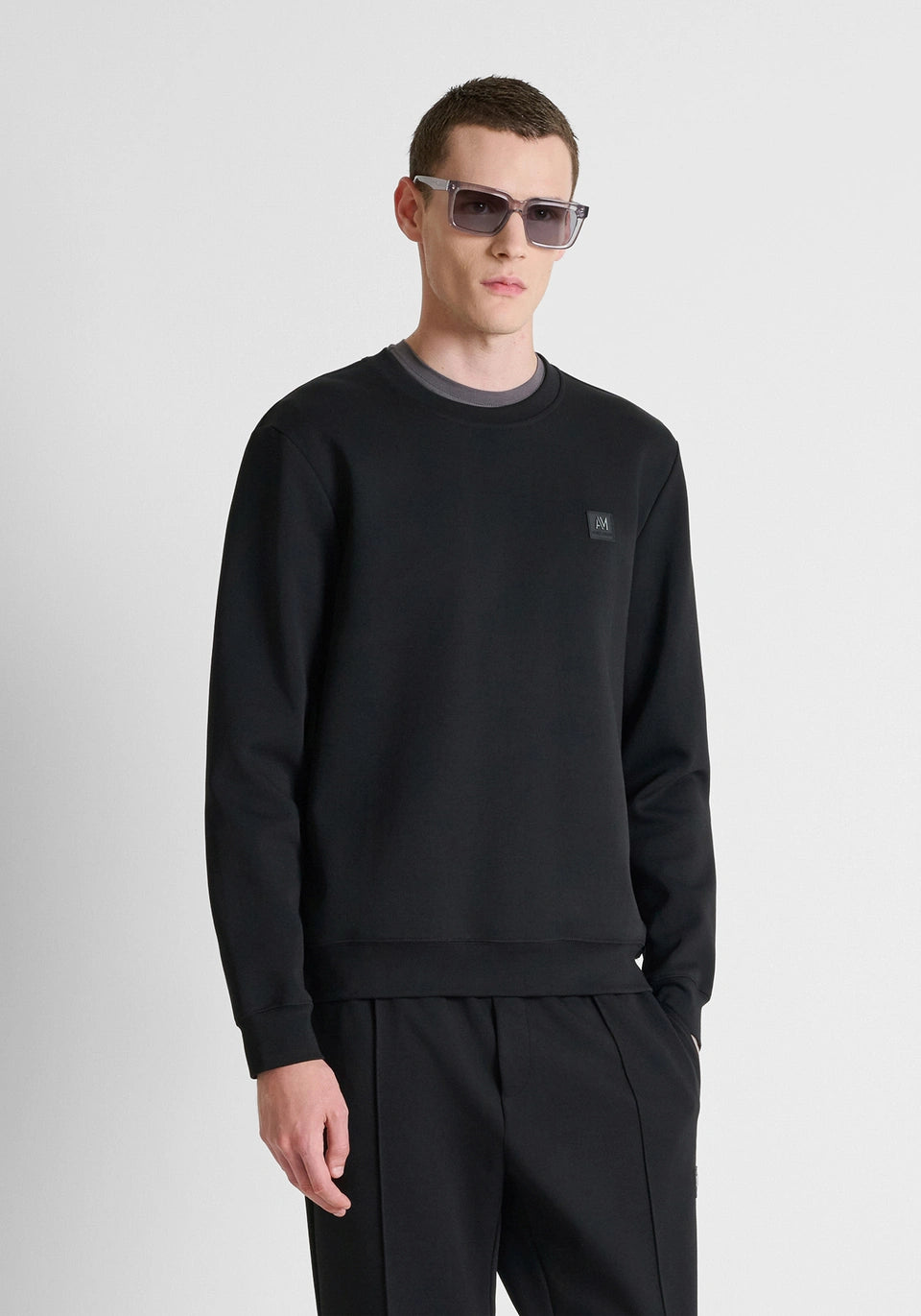Black regular-fit sweatshirt in interlock with plate on heart